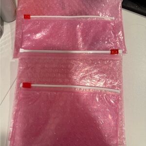 Glossier Set of Pink Bubble Wrap Pouches